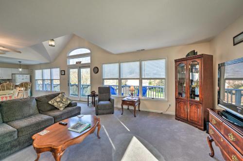 a living room with a couch and a tv at Seaside Escape Less Than 1 Mi to Cape May Public Beach in West Cape May
