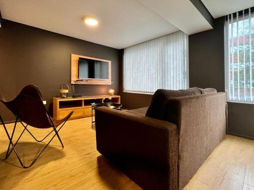 Μια τηλεόραση ή/και κέντρο ψυχαγωγίας στο Seaport Apartments Pacifico H