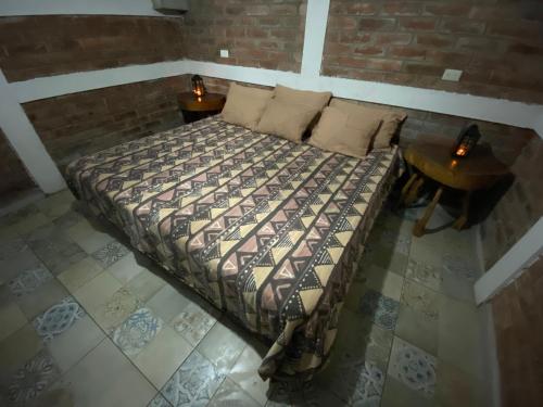 Krevet ili kreveti u jedinici u okviru objekta Hostal Café El Cedro