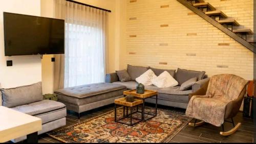 Posezení v ubytování Εν Ιωαννίνοις loft 2