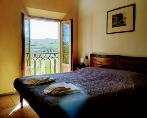 Katil atau katil-katil dalam bilik di Agriturismo Contea di val d'amone