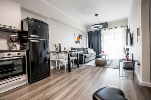 Kuchyň nebo kuchyňský kout v ubytování Escape Luxury Apartment