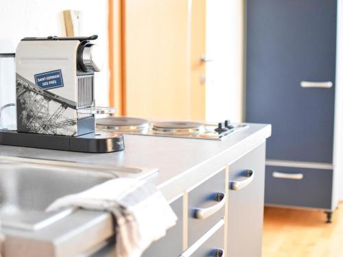 a kitchen counter with a mixer on top of it at Ferienwohnung am Sattelhof #2 in Türnitz