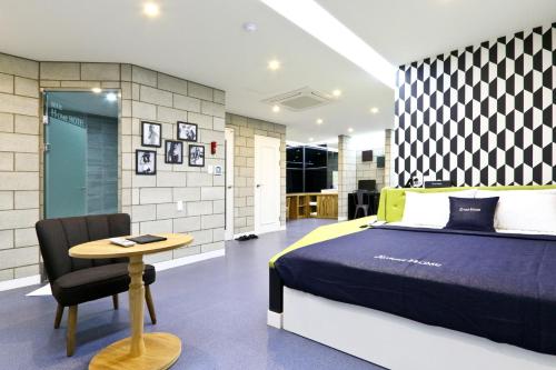 Postel nebo postele na pokoji v ubytování Hotel Home