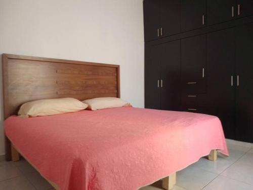 En eller flere senge i et værelse på Casa Completa Real de Cana