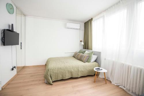 Postel nebo postele na pokoji v ubytování Smart lux
