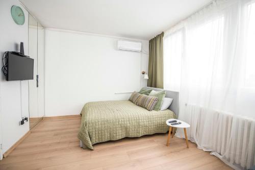 Voodi või voodid majutusasutuse Smart lux toas