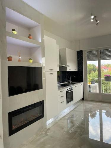 Dapur atau dapur kecil di Appartamento confortevole M.I. Casa