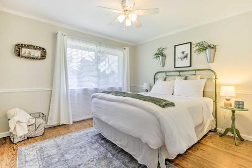 a bedroom with a bed and a ceiling fan at Modern Home in Napa Area with Hot Tub and Game Room! in Petaluma