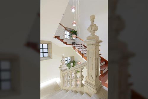 a view of a staircase in a house at Pazo de Mendoza in Baiona