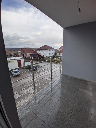 a balcony with a view of a parking lot at Ika LuX apartmani 4* in Sjenica