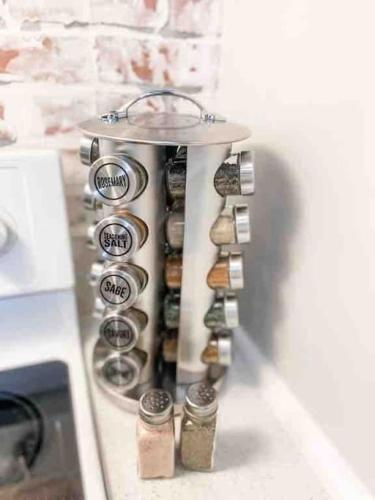 a spice rack in the corner of a kitchen at Renovated Bungalow Getaway in Philomath