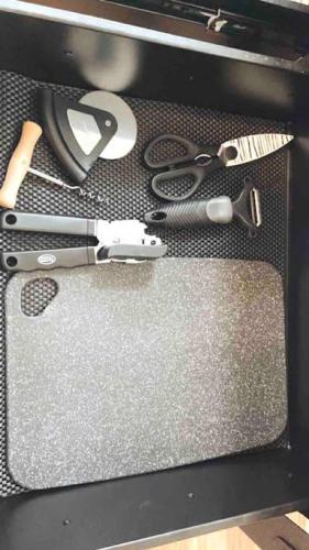 a drawer with scissors and other kitchen utensils on it at Renovated Bungalow Getaway in Philomath