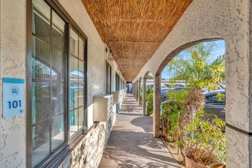 a hallway of a building with a roof at Royal Hawaiian Inn - Mid City, Los Angeles in Los Angeles