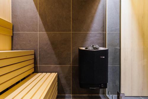a wall with a subwoofer in a room at Hakuba Jolie Maison by Jade Group in Hakuba