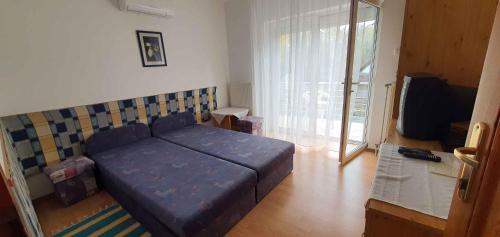 Postel nebo postele na pokoji v ubytování Apartments in Siofok - Balaton 43407