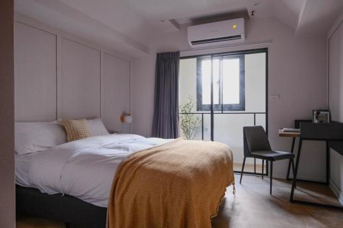 Postel nebo postele na pokoji v ubytování Giant Rich Hotel