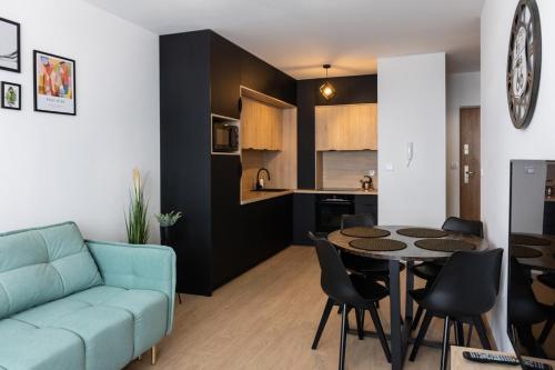 Kuchyň nebo kuchyňský kout v ubytování Apartament przy PILECKIEGO 33