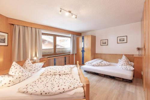 Llit o llits en una habitació de Appartement Rosengarten