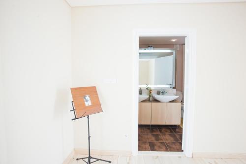 a bathroom with a sink and a mirror at Villa Infinity Floating in Belgrade