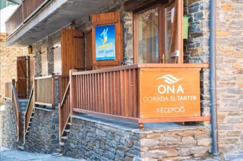 a building with a sign that reads onea dordord and harper re at Appartement Ona Dorada el Tarter in Ransol