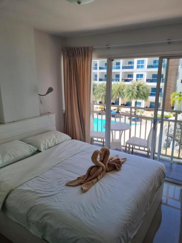 Ένα ή περισσότερα κρεβάτια σε δωμάτιο στο GrandBeach 2 condominium A34