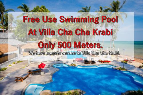 a sign that says free use swimming pool at villa chico chi khal at Wild Orchid Villa Krabi in Ao Nam Mao