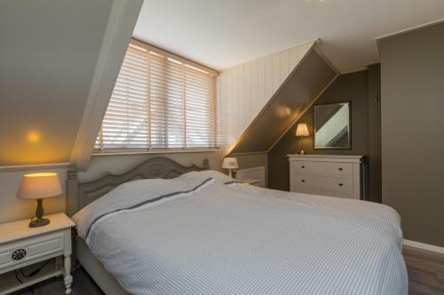 Postel nebo postele na pokoji v ubytování Luxe vakantiewoning Domburg, dichtbij strand