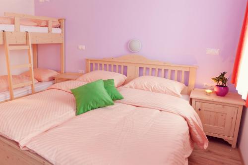 Postel nebo postele na pokoji v ubytování Guesthouse Macesen