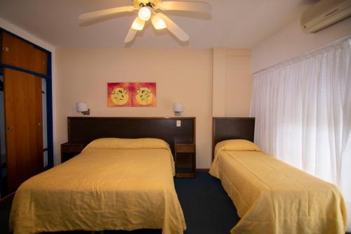 Katil atau katil-katil dalam bilik di Hotel Playa