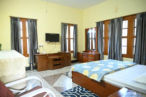 Postel nebo postele na pokoji v ubytování Nahorjan Tea Homestay