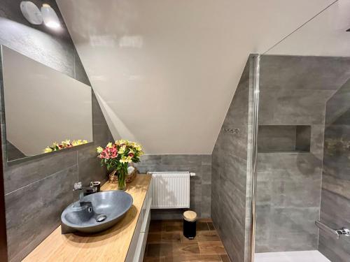 Koupelna v ubytování Apartament Katarzyny Puzyńskiej