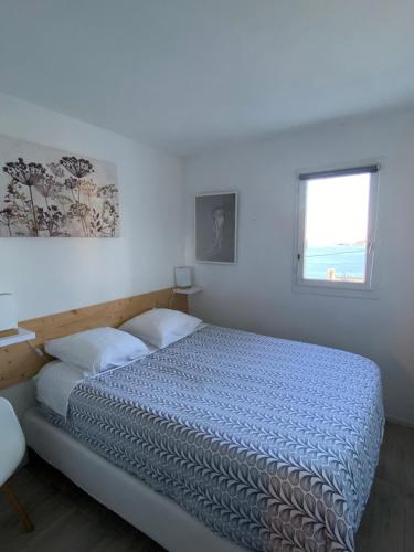 Postel nebo postele na pokoji v ubytování Appart n° 14, VUE MER, Perros-Guirec
