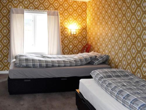 Postel nebo postele na pokoji v ubytování Holiday home Snillfjord