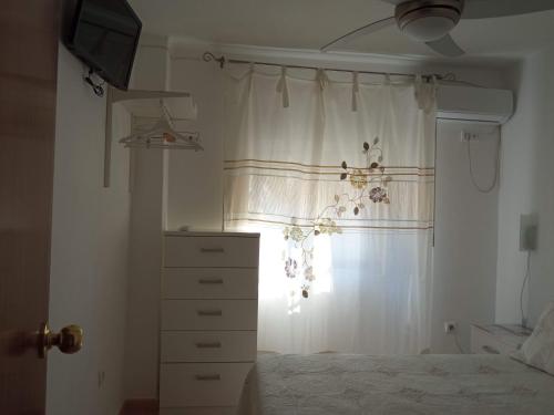 Cama o camas de una habitación en Apartamento compartido con la Anfitriona