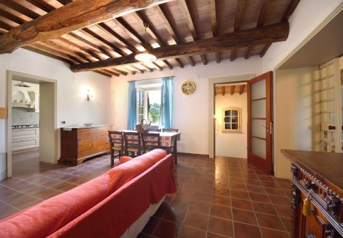 a living room with a couch and a table at Villa Santa Maria Deruta in Deruta