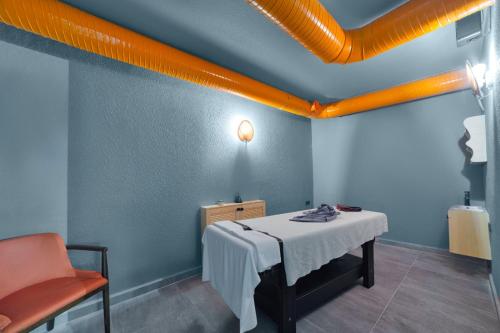 Ένα ή περισσότερα κρεβάτια σε δωμάτιο στο Aria Riva Apart Hotel