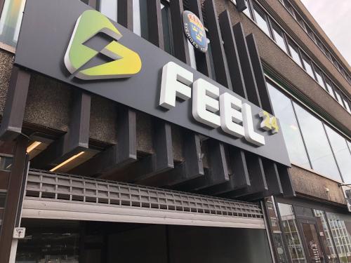 a fedex sign on the side of a building at Quality Hotel Grand Royal in Narvik