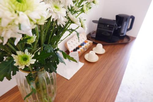 Příslušenství pro přípravu čaje a kávy v ubytování PALAZZO CAMERLENGO Suites Relax
