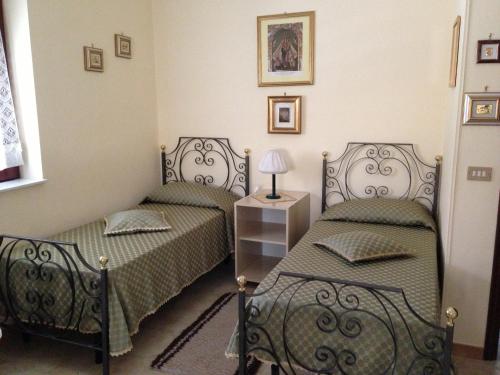 Ένα ή περισσότερα κρεβάτια σε δωμάτιο στο Bed and Breakfast Padalino