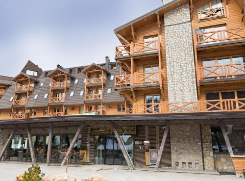 an image of the front of the apartment building at Super G - Vucko in Jahorina