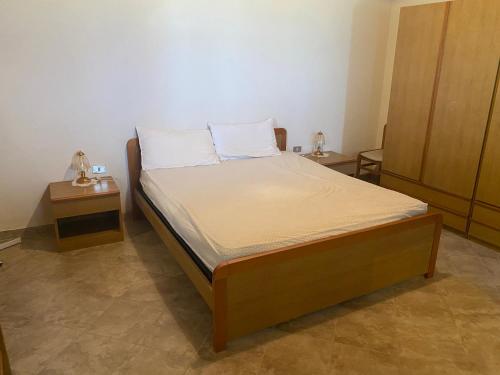 Posteľ alebo postele v izbe v ubytovaní Baràka - Bungalow a 5m dal mare