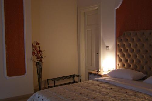Posteľ alebo postele v izbe v ubytovaní Room in Faneromeni's grove
