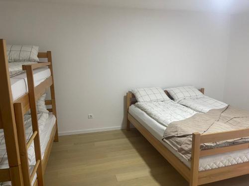 En eller flere senge i et værelse på Apartment Snow Bjelašnica