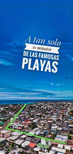 a sign that reads la solla to minnesota de las franciscas plays at Suite Familiar en Puerto Ayora in Puerto Ayora