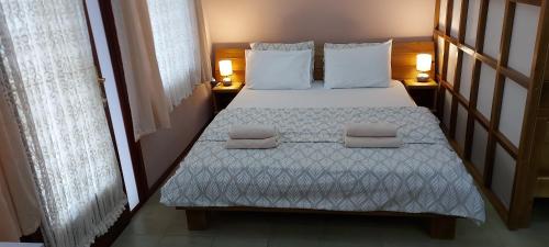 Krevet ili kreveti u jedinici u okviru objekta Apartmani Neca