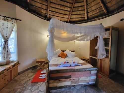 Postel nebo postele na pokoji v ubytování Edaala Comfort - Cottage Rooms