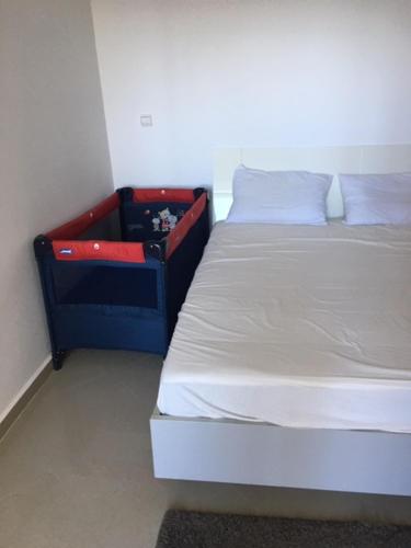 Krevet ili kreveti u jedinici u okviru objekta Marina Golf Asilah vue mer