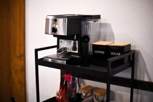 a coffee maker on top of a shelf at East Mountain Villa in Batina