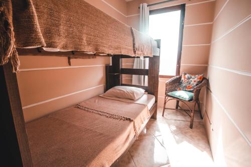 Ένα ή περισσότερα κρεβάτια σε δωμάτιο στο Bacana Hotel Boutique